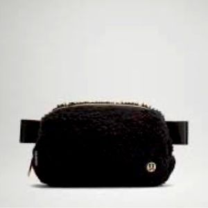LuluLemon Everywhere Belt Bag in Black Fleece and Gold Accents